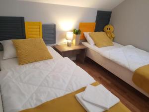 Postel nebo postele na pokoji v ubytování Corden Village