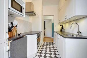 a kitchen with a sink and a counter top at Cozy appartment for 2 in Aarhus in Aarhus