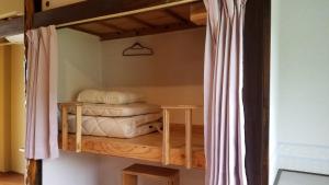 Guest House Gamigami客房内的一张或多张双层床