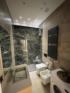 A bathroom at Minimal house - 4persone - centro
