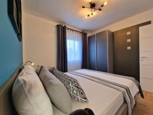 Posteľ alebo postele v izbe v ubytovaní Apartment Tome-3 by Interhome