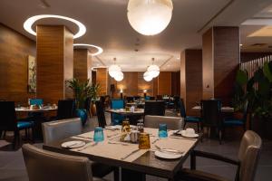 مطعم أو مكان آخر لتناول الطعام في Eko Hotel Signature
