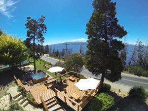 an aerial view of a deck with a view of the ocean at Pailahue Cabañas Lodge in San Carlos de Bariloche