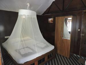 Postel nebo postele na pokoji v ubytování Abba's Glory Land - Agonda