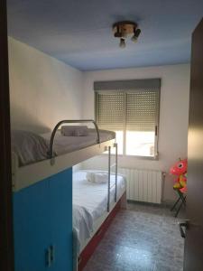 Katil atau katil-katil dalam bilik di Bright apartment in Barbastro, 70m², parking included