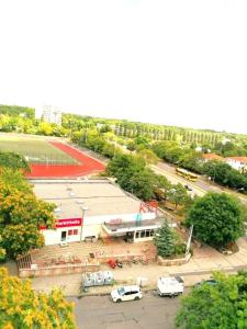 an overhead view of a parking lot with cars parked at 20m² Cozy Nice Room 12 min. near the center Alexandeplatz in Berlin