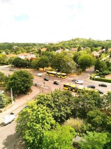 a group of buses parked in a parking lot at 20m² Cozy Nice Room 12 min. near the center Alexandeplatz in Berlin