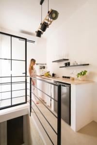 A kitchen or kitchenette at Palazzo Manzoni by MANZONI COLLECTION