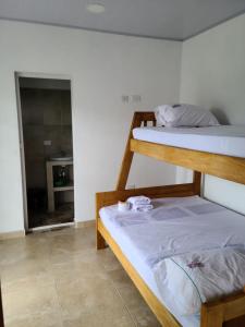 Katil atau katil-katil dalam bilik di Olamar Hostal