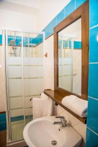 Koupelna v ubytování La Borgata Rooms + 37 fotografií