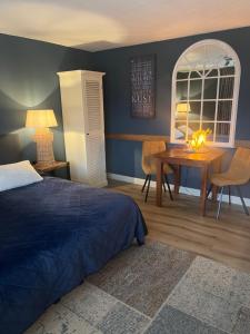 Postel nebo postele na pokoji v ubytování B&B De Koog Texel