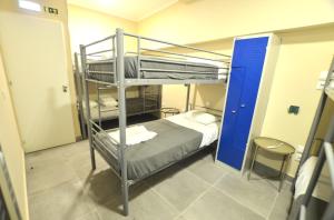 Postel nebo postele na pokoji v ubytování Rooms DP Setúbal