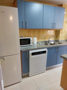 Kuchyňa alebo kuchynka v ubytovaní Residencial Mediterráneo