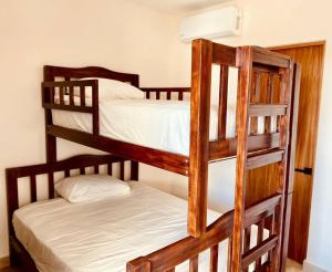 Krevet ili kreveti na sprat u jedinici u okviru objekta Dpto C-alberca Playa La Bamba - Facturamos