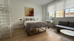 Tempat tidur dalam kamar di Room Pinar - Apartamento con todas las comodidades