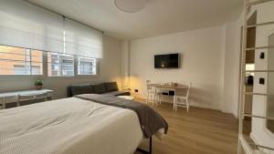 Снимка в галерията на Room Pinar - Apartamento con todas las comodidades в Мадрид