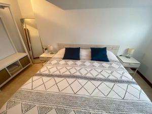 Ένα ή περισσότερα κρεβάτια σε δωμάτιο στο Somo apartment