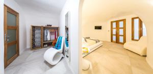 Postel nebo postele na pokoji v ubytování Elite Luxury Suites