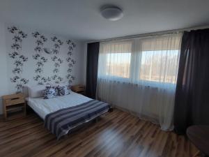 Postel nebo postele na pokoji v ubytování Noclegi Bytom - OPAL