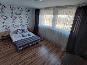 Postel nebo postele na pokoji v ubytování Noclegi Bytom - OPAL