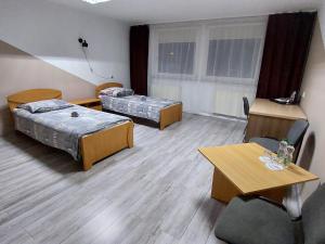 Postel nebo postele na pokoji v ubytování Noclegi Bytom - OPAL
