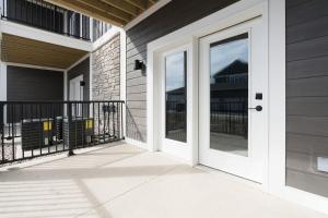 a white door on the side of a house at Corporate Housing by MGM in Whitestown