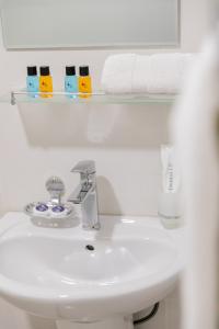 Koupelna v ubytování Big Star Hotel + 11 fotografií