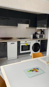A cozinha ou cozinha compacta de Appartement T3 vue mer sur ilet Gosier