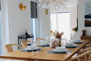 ランゲンにあるKomfortables Penthouse 200 qmのギャラリーの写真