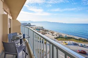 a balcony with a view of the ocean at Crete - Heraklion Sea View Apartment 2 in Heraklio Town