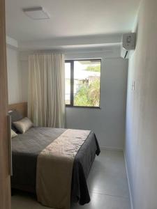 Cama o camas de una habitación en Ondina e Beira Mar