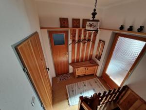 an overhead view of a room with a staircase and a door at LaLo Alm - Berge erleben in Lachtal