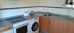 Kuchyň nebo kuchyňský kout v ubytování La CASUCA ENTRE TINAS + 22 fotografií