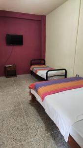 Katil atau katil-katil dalam bilik di Doña Elena