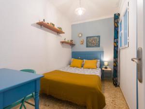 Кровать или кровати в номере Casita Canaria Playa Beachfront Access & Lateral Ocean View With Terrace