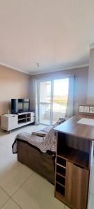 Postel nebo postele na pokoji v ubytování Apto na praia dos ingleses