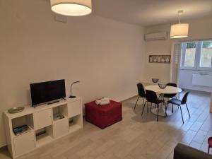 TV/trung tâm giải trí tại MaGi Mondello