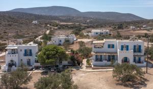 an aerial view of a village with white houses at SOHOROS STUDIOS in Irakleia