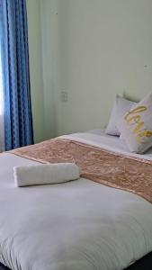 Posteľ alebo postele v izbe v ubytovaní Tamiasuites Apartment