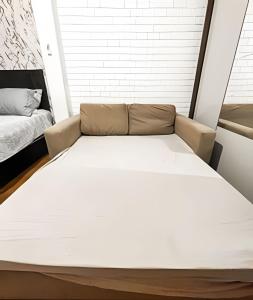 Katil atau katil-katil dalam bilik di Aconchegante estúdio no Flamengo para 4 pessoas
