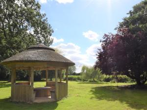 a gazebo in the middle of a field at 1 Bed in Thetford 76493 in East Harling