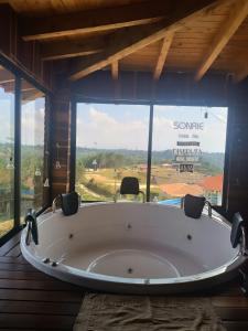 Um banheiro em Cabaña con Jacuzzi ilimitado/BBQ/Hermosas vistas