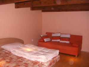Ένα ή περισσότερα κρεβάτια σε δωμάτιο στο Apartmany Kanianka