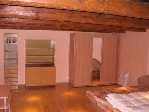 Posteľ alebo postele v izbe v ubytovaní Apartmany Kanianka