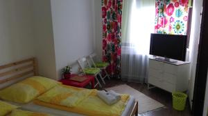 Voodi või voodid majutusasutuse Gasthof Papillon toas