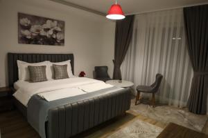 Voodi või voodid majutusasutuse Andoena Resort toas