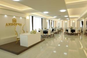 Restoran või mõni muu söögikoht majutusasutuses Andoena Resort