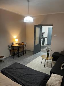 Postel nebo postele na pokoji v ubytování Apartmán u Hradu