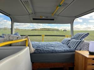 two beds sitting in the back of a van at Röhrencamp Schöten/Apolda in Apolda