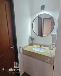 a bathroom with a sink and a mirror at m boero 3231 in Rosario